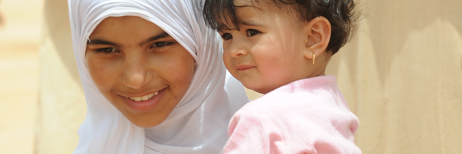 Mutter mit Kind in Libyen